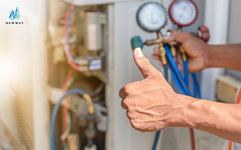 Professional HVAC technician performing air conditioning installation service